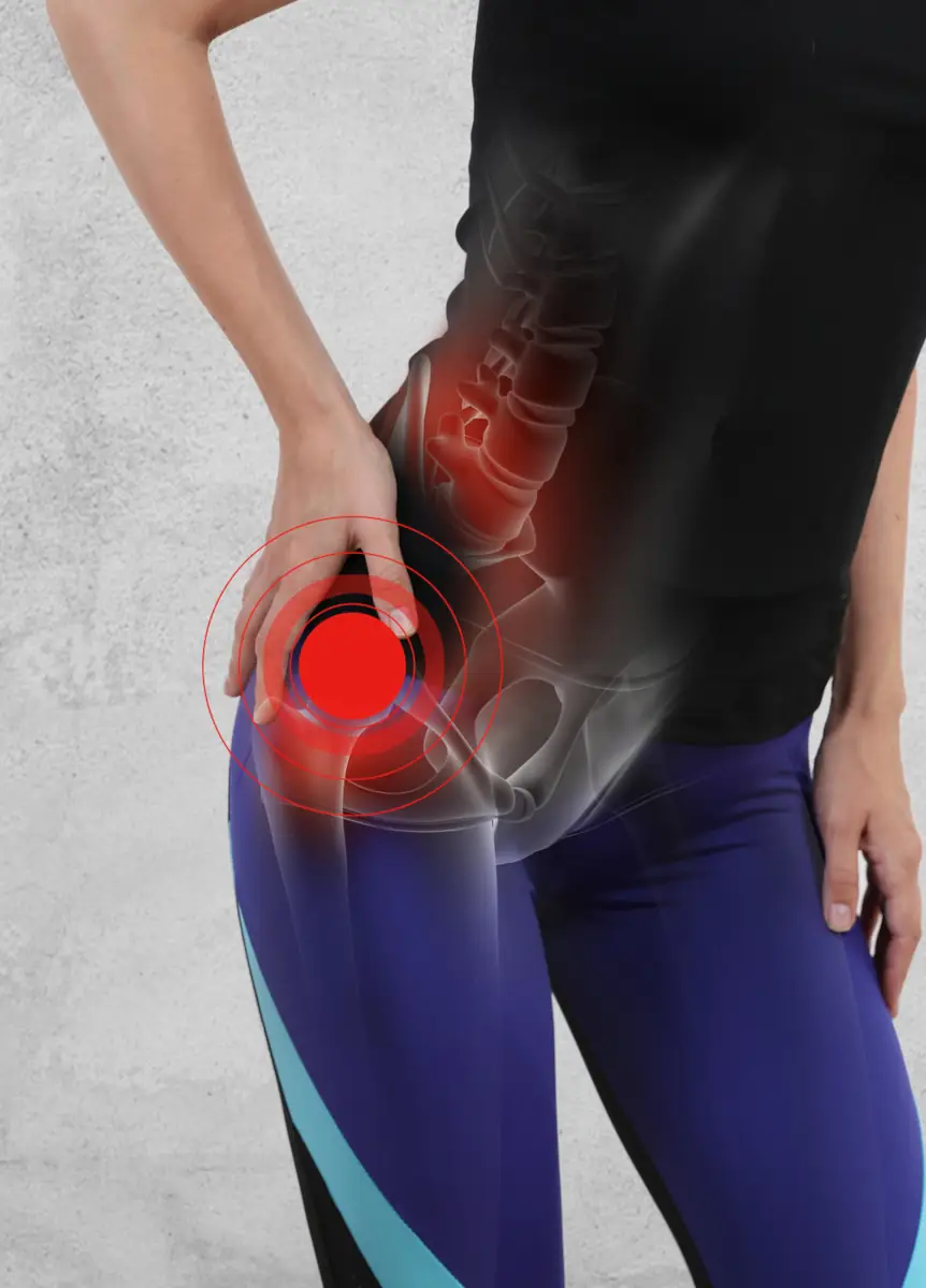 Person experiencing hip pain Person experiencing hip pain